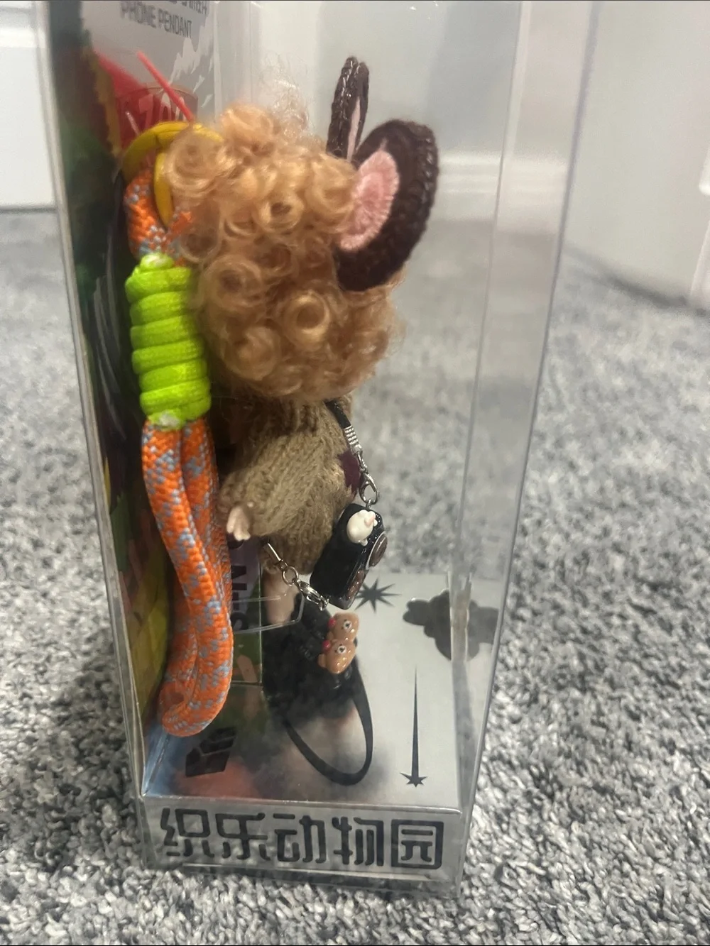 Luolifen (or Loli Fen) BJD (Ball Jointed Doll) phone pendant.